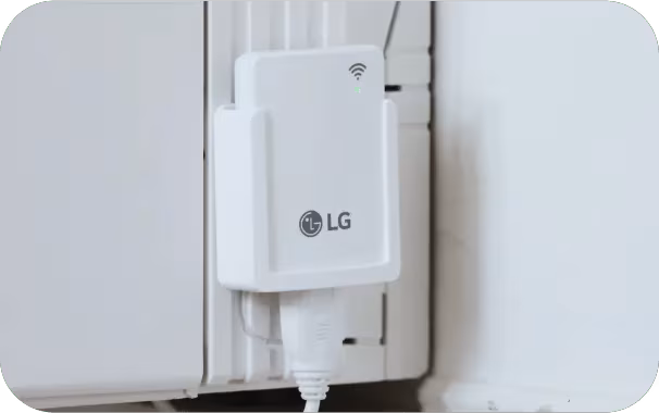 Compass technician installing LG heat pump water heater Elgin IL